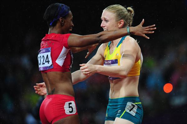 Sally Pearson of Australia hugs Kellie Wells of the United States after winning the gold medal in the Women's 100m Hurdles Final on Day 11 of the London 2012 Olympic Games on 7 August 2012 (Getty Images)
