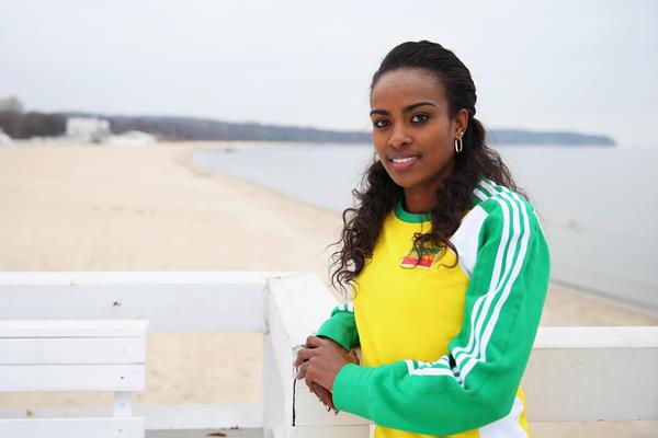 Genzebe Dibaba on the pier with beach in background ahead of Sopot 2014 ()