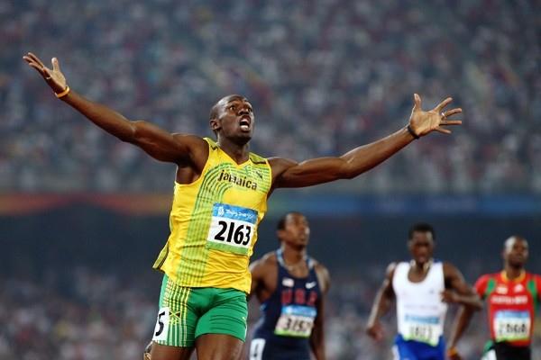 Usain Bolt celebrates after breaking the 200m world record (Getty Images)