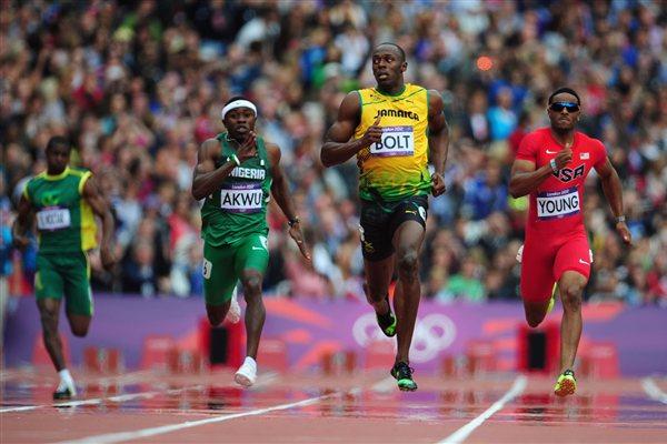 Usain Bolt of Jamaica leads Noah Akwu of Nigeria and Isiah Young of the United States in the Men's 200m Round 1 Heats on Day 11 of the London 2012 Olympic Games on 7 August 2012 (Getty Images)