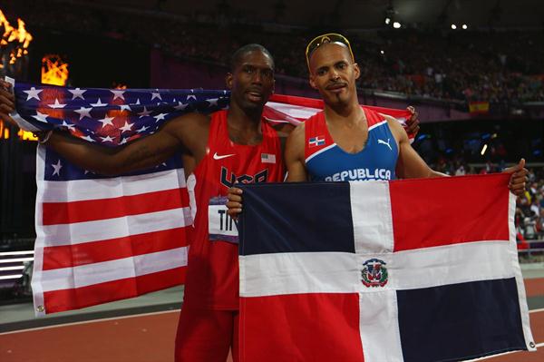 (R-L) Gold medalist Felix Sanchez of Dominican Republic and silver medalist Michael Tinsley of the United States pose after the Men's 400m Hurdles final on Day 10 of the 2012 Olympic Games in London on 6 August 2012 (Getty Images)