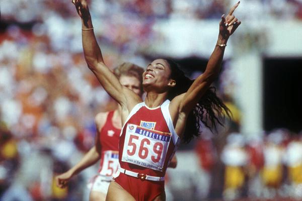 Florence Griffith-Joyner celebrates 100m gold at the 1988 Olympics in Seoul (Getty Images)
