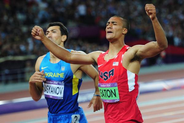 Ashton Eaton of the United States enjoying his first place as he crosses the finish line next to Oleksiy Kasyanov of Ukraine in the Men's Decathlon 1500m  of the London 2012 Olympic Games on 9 August 2012 (Getty Images)