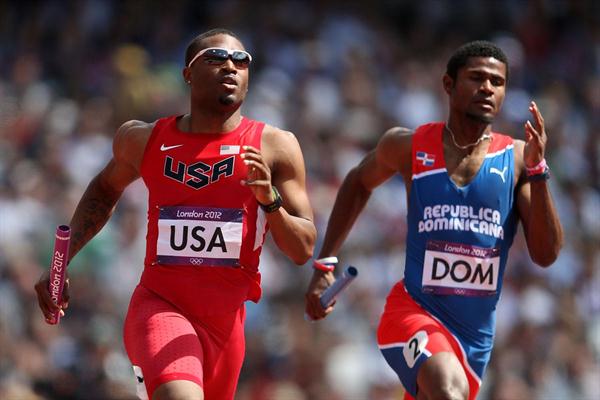Manteo Mitchell of the United States and Gustavo Cuesta of Dominican Republic compete during the Men's 4 x 400m Relay Round 1 heats on Day 13 of the London 2012 Olympic Games  on August 9, 2012 (Getty Images)