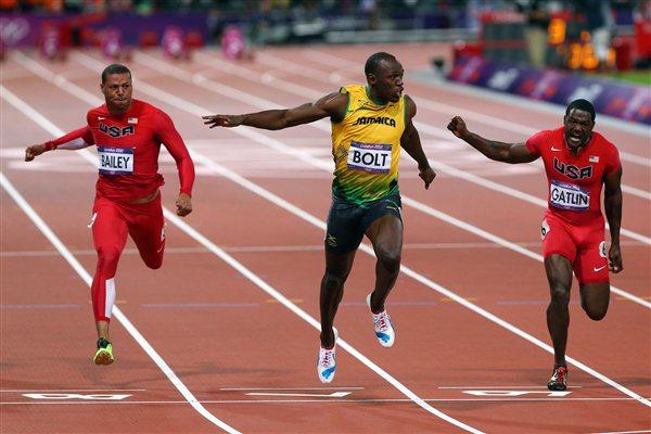 Usain Bolt of Jamaica crosses the finish line ahead of Ryan Bailey of the United States and Justin Gatlin of the United States to win the Men's 100m Semifinal on Day 9 of the London 2012 Olympic Games on 5 August 2012 (Getty Images)