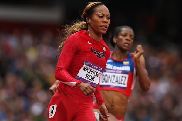 Sanya Richards-Ross of the United States runs alongside Norma Gonzalez of Colombia in the Women's 200m heat on Day 10 of the London 2012 Olympic Games on 6 August 2012 (Getty Images)