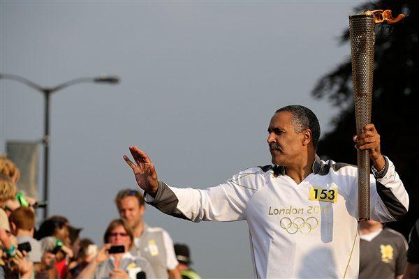 Daley Thompson carrying the Olympic torch (Getty Images)