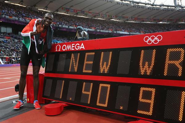 David Lekuta Rudisha of Kenya celebrates next to the clock after winning gold and setting a new world record in the Men's 800m Final on Day 13 of the London 2012 Olympic on 9 August 2012 (Getty Images)