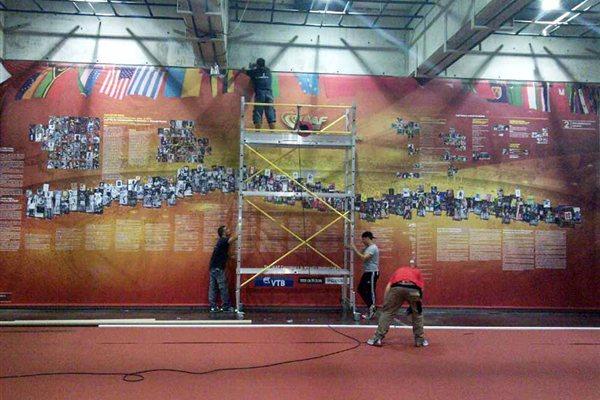 IAAF Centenary Historic Exhibition - one of the giant 4m high displays are erected (Chris Turner / IAAF)