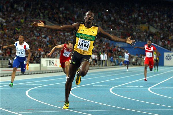 Usain Bolt of Jamaica celebrates victory and a new world record in the men's 4x100 metres relay final  (Getty Images)
