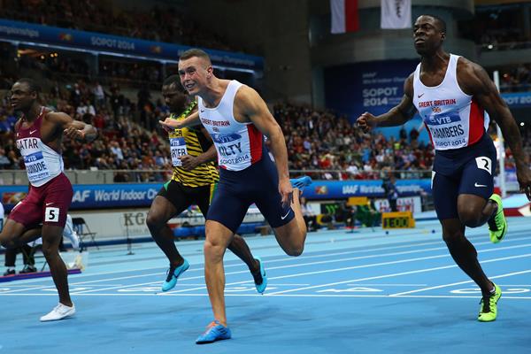 Richard Kilty crosses the finish line to win gold at Sopot 2014 ()