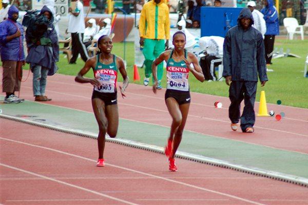 Kenyans Gladys Cherono (0604) and Veronica Nyaruai (0605), 1-2 in the 5000m in Porto-Novo (Yomi Omogbeja/AthleticsAfrica.Com)