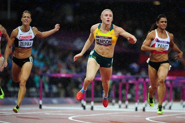 Sally Pearson of Australia leads Phylicia George of Canada and Nevin Yanit of Turkey during the Women's 100m Hurdles Final on Day 11 of the London 2012 Olympic Games on 7 August 2012 (Getty Images)