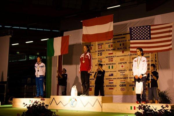 Women's podium at Ponte di Legno, from left: runner-up Valentina Bellotti (ITA), winner Andrea Mayr (AUT), and bronze medallist Morgan Arritola (USA) (WMRA)