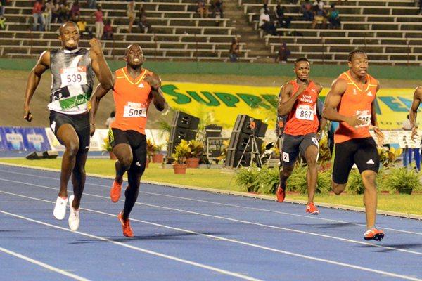 Yohan Blake (r) en route to victory over Usain Bolt in the Jamaican trials 200m (Anthony Foster)