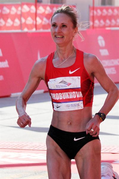 All smiles - Liliya Shobukhova takes her third straight Chicago Marathon title (Getty Images)