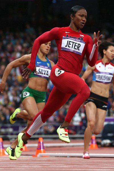 Carmelita Jeter of the United States runs in the Women's 200m heat on Day 10 of the London 2012 Olympic Games at the Olympic Stadium on August 6, 2012 (Getty Images)