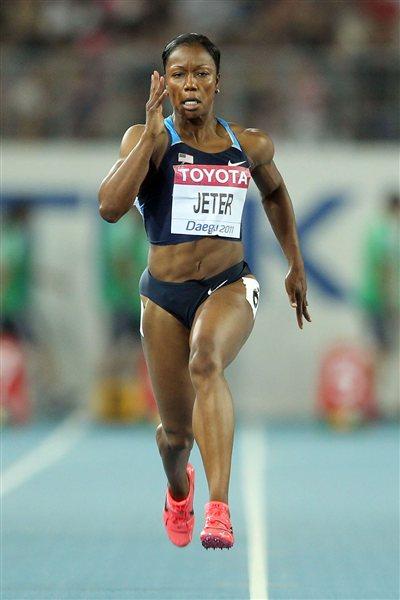 Carmelita Jeter of United States going for victory in the women's 100 metres final  (Getty Images)