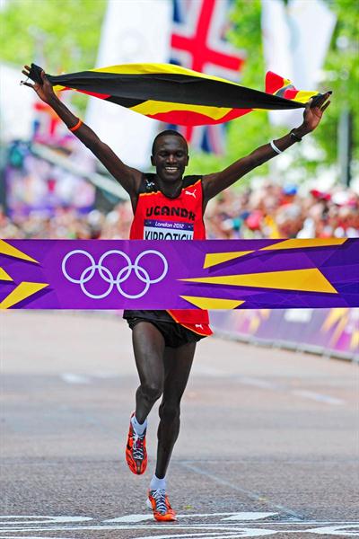 Stephen Kiprotich of Uganda celebrates as he approaches the line to win gold in the Men's Marathon the London 2012 Olympic Games at The Mall on August 12, 2012 (Getty Images)