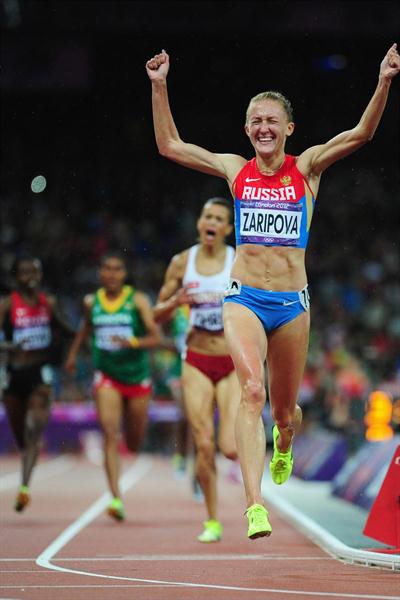 Yuliya Zaripova of Russia celebrates as she crosses the finish line to win the gold medal in the Women's 3000m Steeplechase final on Day 10 of the London 2012 Olympic Games on 6 August 2012 (Getty Images)