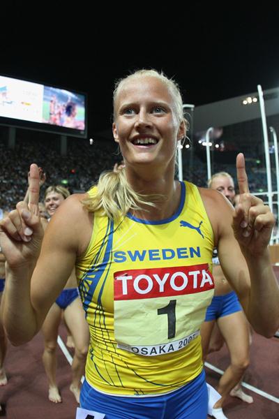 Gold medalist Carolina Kluft of Sweden leads the field in a lap of honour following the 800m of the Heptathlon (Bongarts/Getty Images)