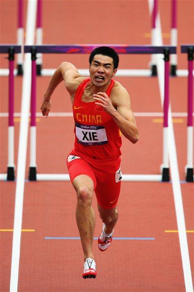 Wenjun Xie of China competes in the Men's 110m Hurdles Round 1 Heats on Day 11 of the London 2012 Olympic Games at Olympic Stadium on August 7, 2012 (Getty Images)