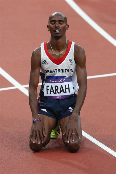 Mo Farah of Great Britain enjoys being Olympic Champion of the Men's 5000m Final  of the London 2012 Olympic Games  on August 11, 2012 (Getty Images)
