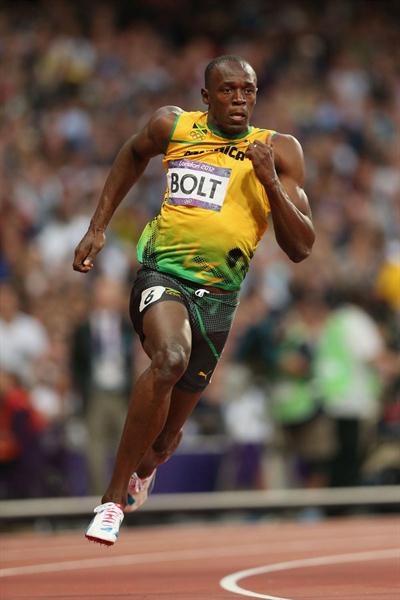 Usain Bolt of Jamaica competes in the Men's 200m Semifinals on Day 12 of the London 2012 Olympic Games at Olympic Stadium on August 8, 2012  (Getty Images)