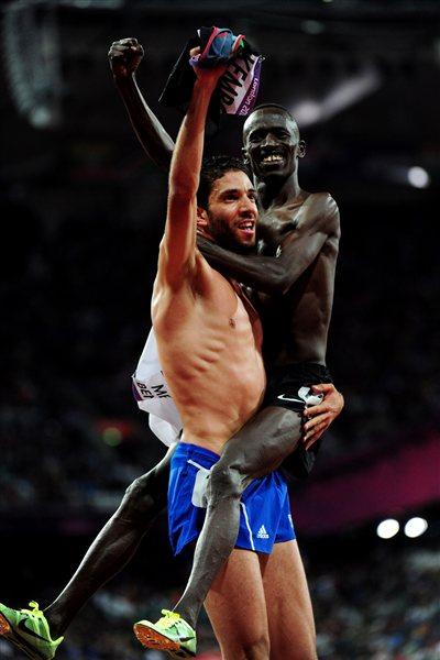 Silver medalist Mahiedine Mekhissi-Benabbad of France celebrates with gold medalist Ezekiel Kemboi of Kenya celebrate after the Men's 3000m Steeplechase on Day 9 of the 2012 London Olympic Games on 5 August 2012 (Getty Images)