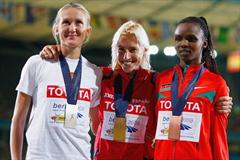 The medallists in the women's 3000m steeplechase (L-R) Yuliya Zarudneva of Russia (silver), Marta Dominguez of Spain (gold) and Milcah Chemos Cheywa of Kenya (bronze) (Getty Images)
