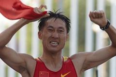 Zhen Wang of China celebrates winning the 20km at the IAAF World Race Walking Cup in Saransk (Getty Images)