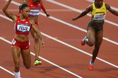 Allyson Felix of the United States celebrates winning gold in the Women's 200m Final on Day 12 of the London 2012 Olympic Games at Olympic Stadium on August 8, 2012 (Getty Images)