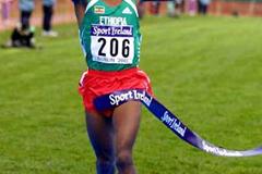 Bekele breaking the tape at the 2002 World Cross Country Championships (Getty Images)