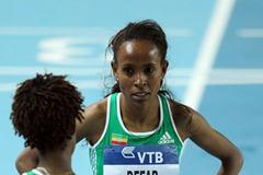 Meseret Defar of Ethiopia is consoled by Gelete Burka of Ethiopia in the Women’s 3000 Metres Final during day three - WIC Istanbul (Getty Images)