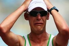 Nathan Deakes crossing the line in the 50Km Walk in Osaka (Getty Images)