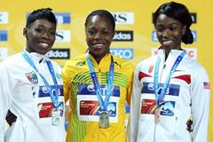 (L-R) Silver medalist Murielle Ahoure of the Ivory Coast, gold medalist Veronica Campbell-Brown of Jamaica and bronze medalist Tianna Madison of Great Britain stand on the podium during the medal ceremony for the Women’s 60 Metres Final on day three - WIC Istanbul (Getty Images)