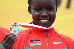 Mercy Cherono of Kenya celebrates her World Junior cross country gold medal in Bydgoszcz (Getty Images)