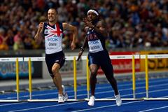 (L-R) David Greene of Great Britain & Northern Ireland and Bershawn Jackson of the USA compete in the men's 400m Hurdles final in Berlin (Getty Images)