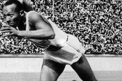 Jesse Owens at the start of the 200m at the 1936 Olympic Games. The legendary American won four gold medals that year. (Getty Images)