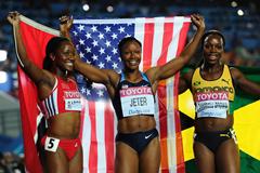 The medallists of the women's 100m - Kelly-Ann Baptiste, Carmelita Jeter and Veronica Campbell-Brown (Getty Images)