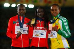 The medallists in the women's 5000m (L-R) Kenya's Sylvia Kibet (silver), Kenya's Vivian Cheruiyot (gold) and Ethiopia's Meseret Defar (bronze) (Getty Images)