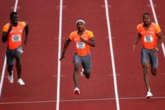 Michael Rodgers (c) takes a narrow 100m victory at the US championships (Getty Images)