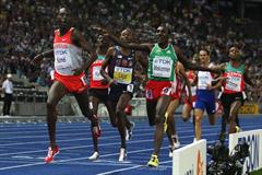 Son of former World Champion Billy Konchellah, Yusuf Saad Kamel of Bahrain crosses the line in the men's 1500m final to take his first global title in the Berlin Olympic Stadium (Getty Images)