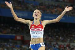 Yuliya Zaripova of Russia celebrates claiming gold in the women's 3000 metres steeplechase final during day four  (Getty Images)
