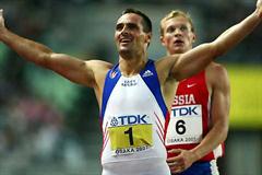 Sebrle crosses the finish of the 1500m to win the Decathlon (Getty Images)