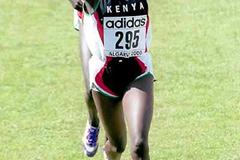 Alice Timbilil of Kenya crosses the finish in Vilamoura to take 2000 IAAF World Junior Cross Country silver (Mark Shearman)