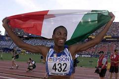 Long Jump Final - Fiona May with Flag (Getty Images)