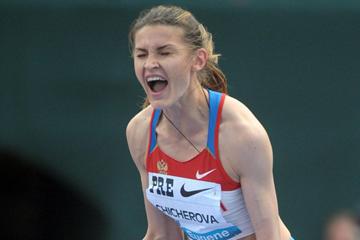 Anna Chicherova celebrates her 2.02m victory in Eugene (Kirby Lee - Image of Sport)