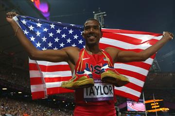 Christian Taylor of the United States celebrates after winning gold in the Men's Triple Jump Final of the London 2012 Olympic Games on 9 August 2012 (Getty Images)