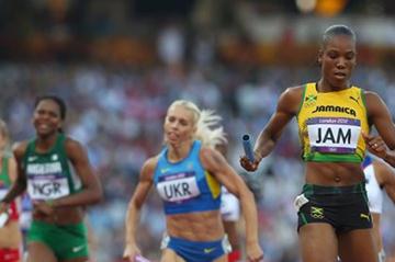 Rosemarie Whyte of Jamaica crosses the finish line and qualifies her team for the Women's 4 x 400m Relay final of the London 2012 Olympic Games on 10 August 2012 (Getty Images)